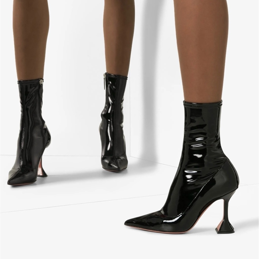 High shiny-heeled uncle boots by Amina Muaddi in very good condition